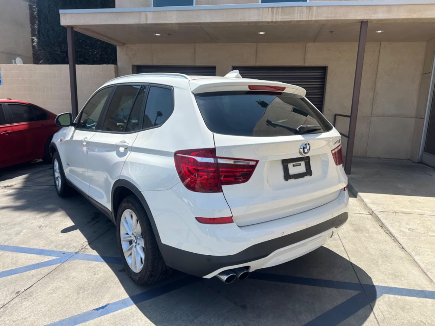 2017 WHITE /BLACK BMW X3 (5UXWX9C37H0) , located at 30 S. Berkeley Avenue, Pasadena, CA, 91107, (626) 248-7567, 34.145447, -118.109398 - Crown City Motors is a used “Buy Here Pay Here” car dealer in Pasadena CA. “Buy Here Pay Here” financing, means that when you purchase your vehicle from our dealership, that you make the payments to the dealership as well. We do not need the banks approval to get you approved for a used auto - Photo#2